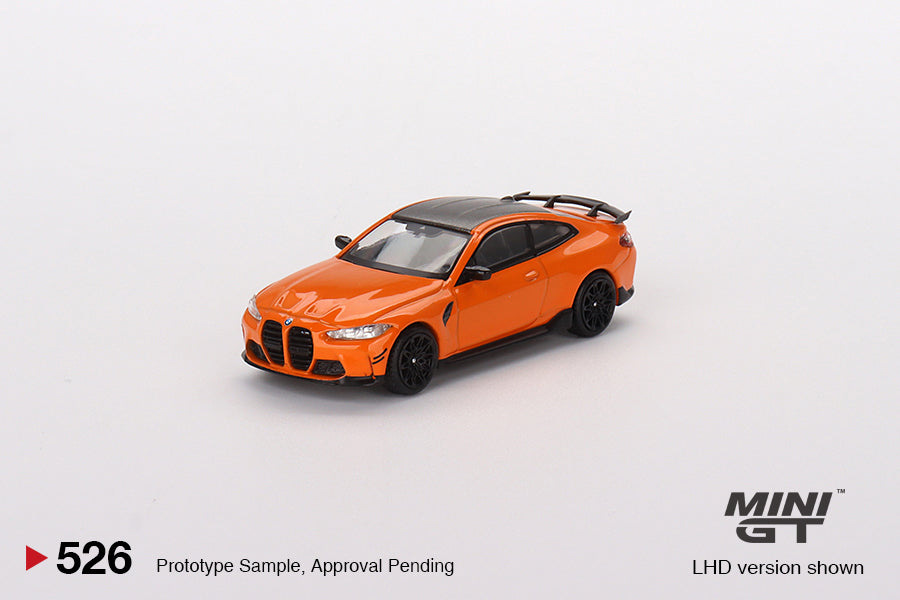 Mini GT BMW M4 CSL 1:64 color naranja con alerón trasero, llantas de goma y acabado detallado deportivo