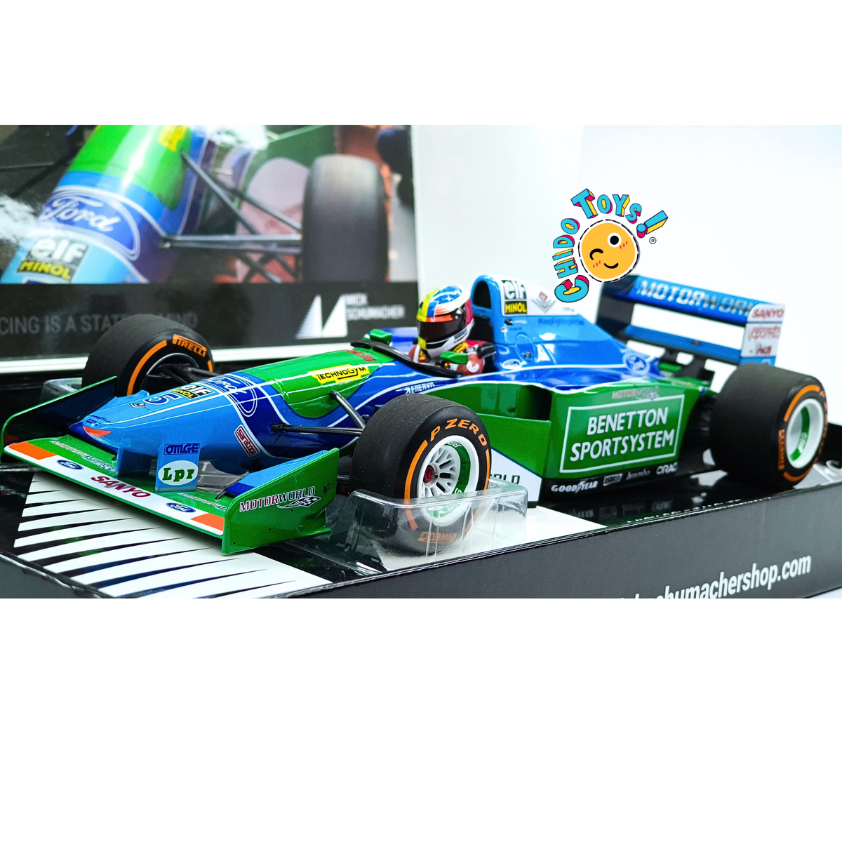 Minichamps Benetton Ford B194 de Mick Schumacher 1:18, azul y verde, con piloto, neumáticos Pirelli y base conmemorativa.