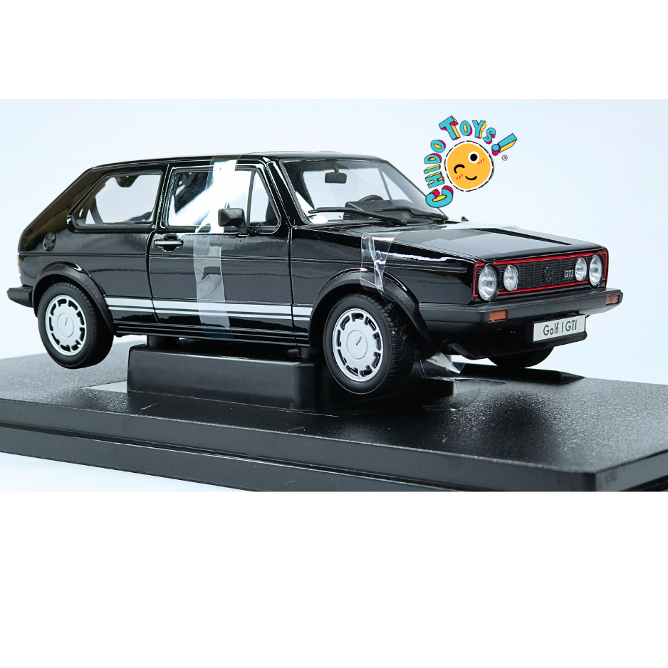 Welly NEX Volkswagen Golf I GTI escala 1:18 color negro con base de exhibición, aperturas funcionales y caja original.