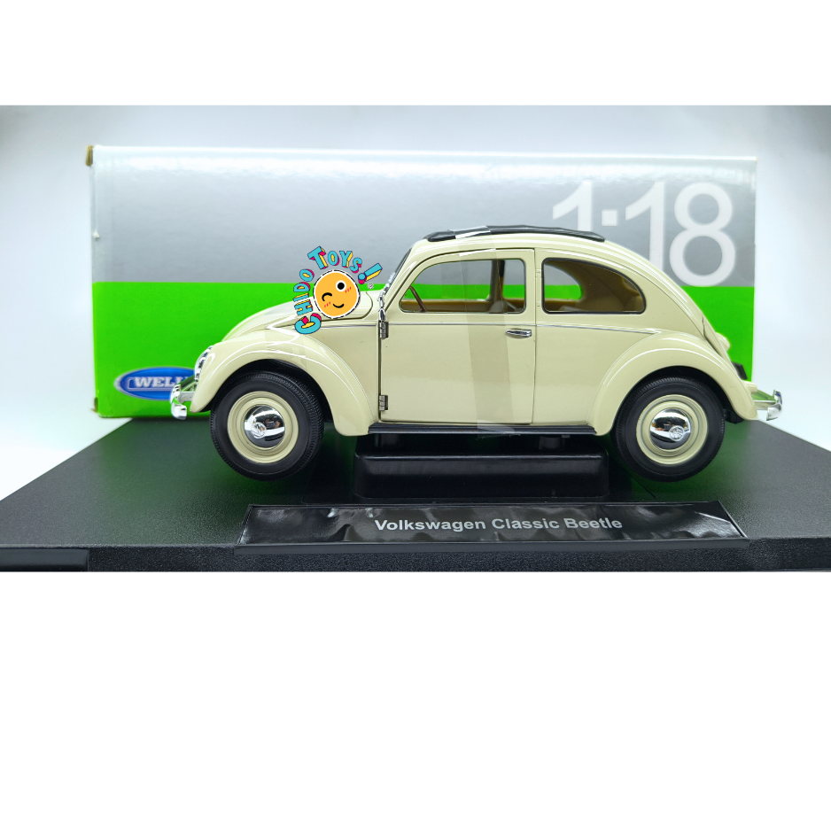 Welly Volkswagen Classic Beetle Split Window 1950 escala 1:18 color marfil con doble ventana trasera, aperturas funcionales y cintillas originales.