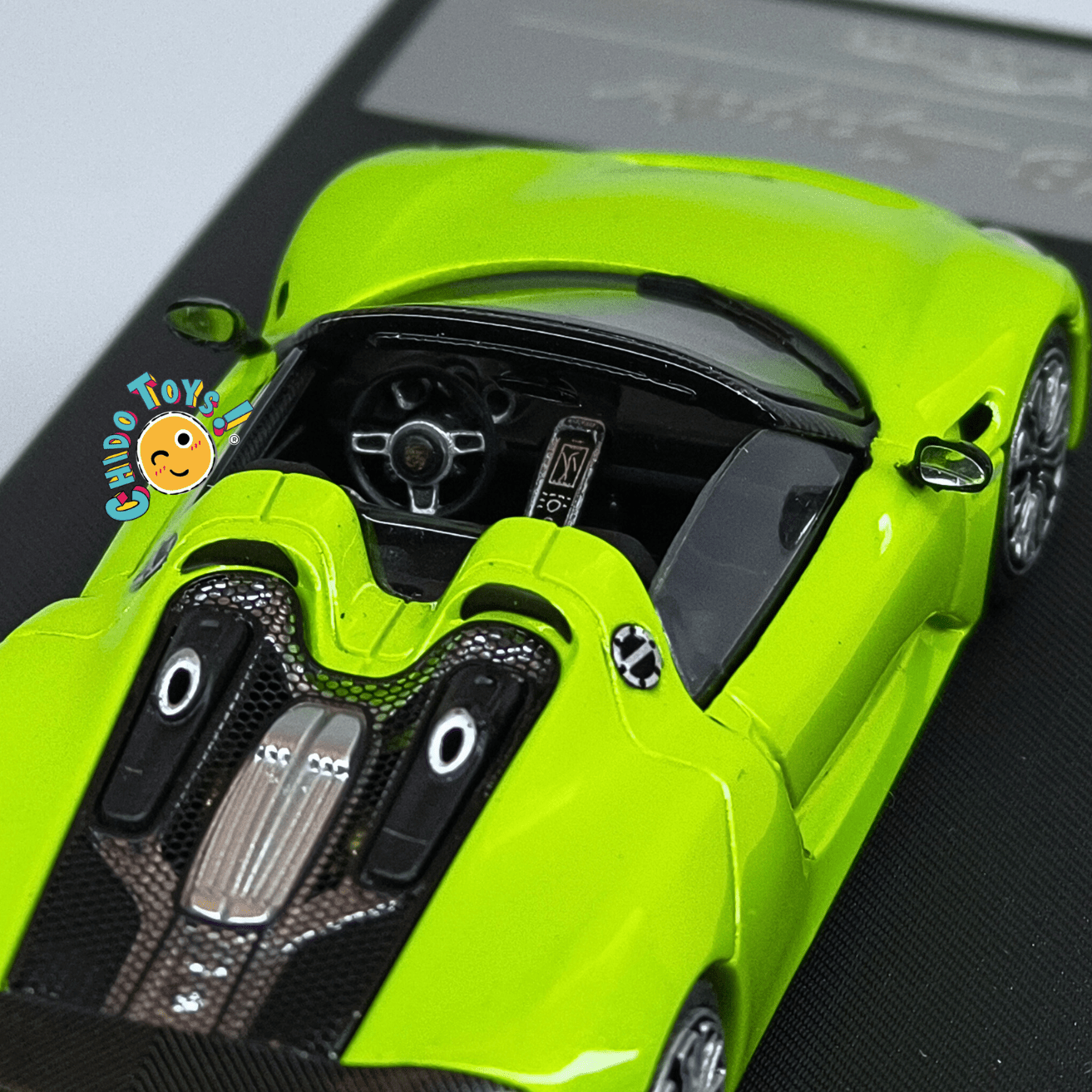 Aurora Model Porsche 918 Spyder 1:64 verde con toldo removible - Chido Toys