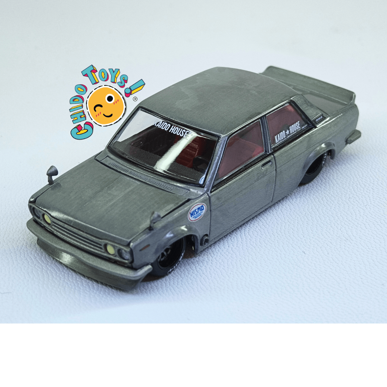 Auto a escala 1/64 Kaido House × Mini GT – Datsun 510 NISMO – Versión CHASE - Chido Toys