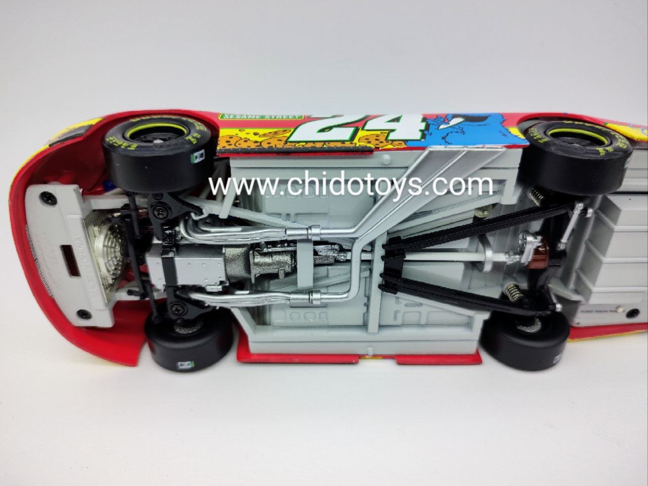 Auto a escala marca Action Racing, Modelo Monte Carlo 2003, Jeff Gordon Foundation 24 - Chido Toys