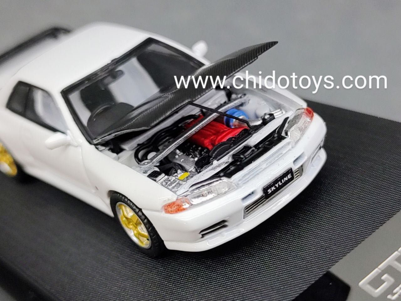 Auto a escala marca Cool Art, Modelo Nissan GTR R32 - Chido Toys