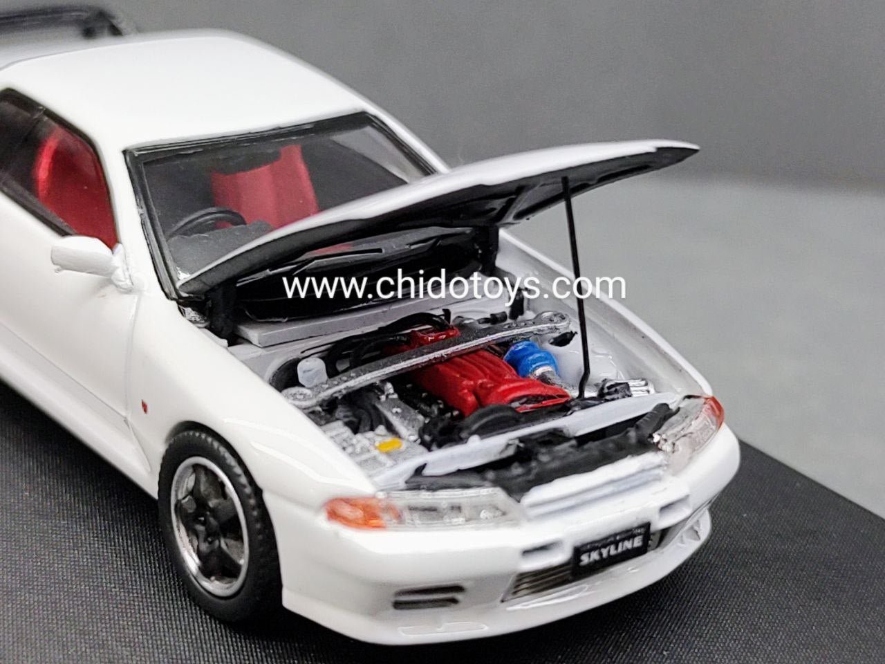 Auto a escala marca Cool Art, Modelo Nissan GTR R32 - Chido Toys