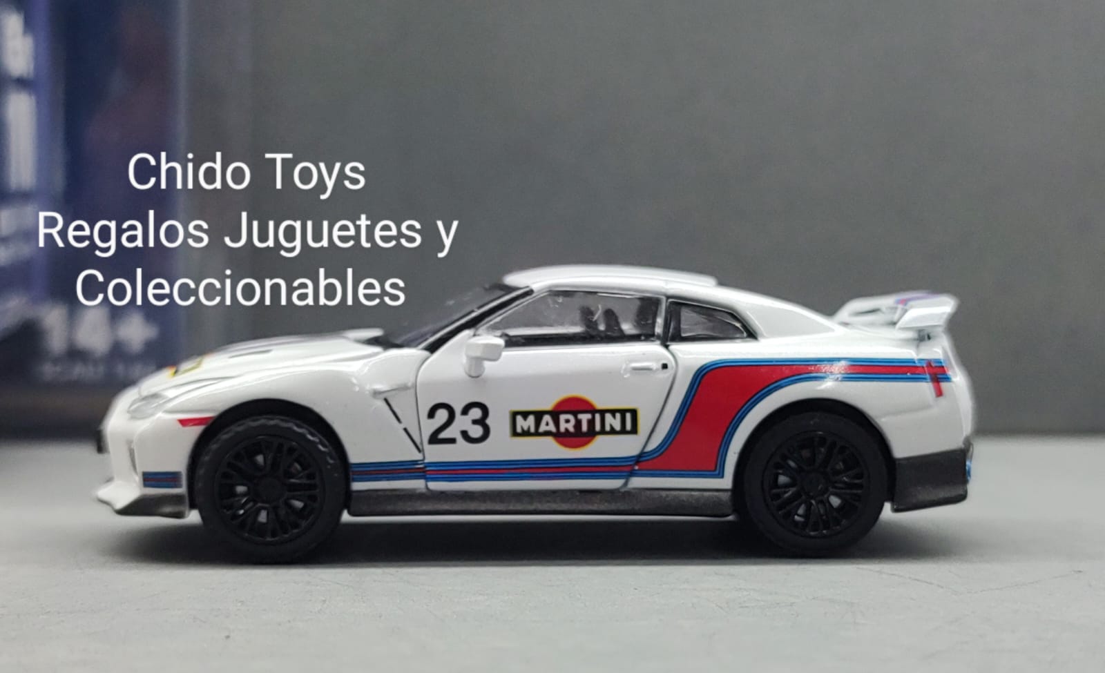 Auto a escala marca Era Car, Modelo Nissan GT - R R35 Martini 23 - Chido Toys