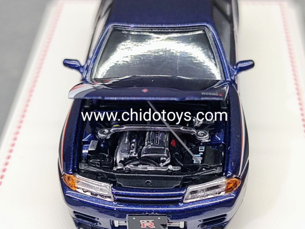 Auto a escala marca Focal Horizon R32 Blue con apertura de cofre - Chido Toys