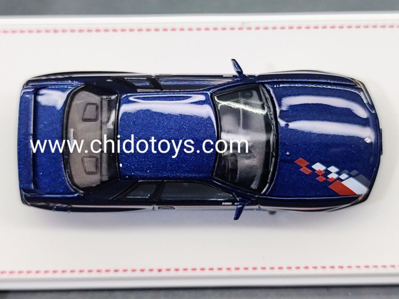 Auto a escala marca Focal Horizon R32 Blue con apertura de cofre - Chido Toys