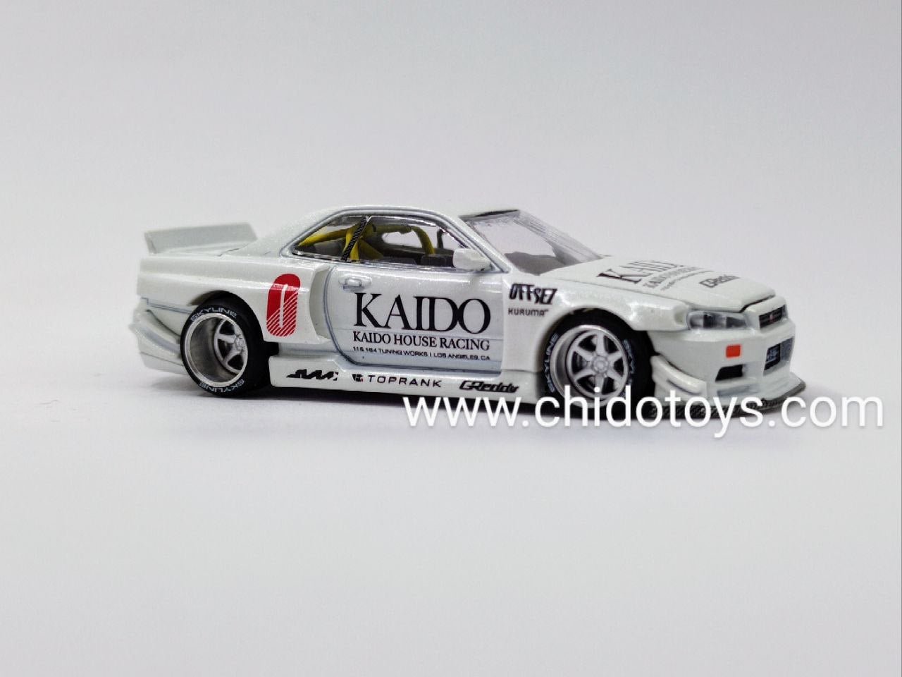 Auto a escala marca Kaido House, Modelo Nissan Skyline GT - R (R34) - Chido Toys