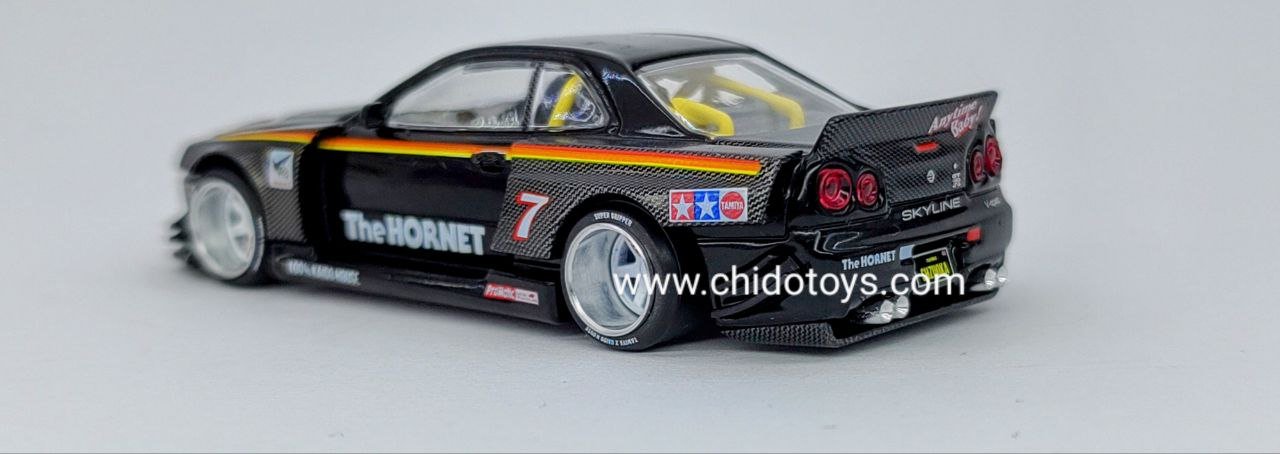 Auto a escala marca Kaido House & Tamiya, Modelo Skyline GT - R R34 "The Hornet" - Chido Toys