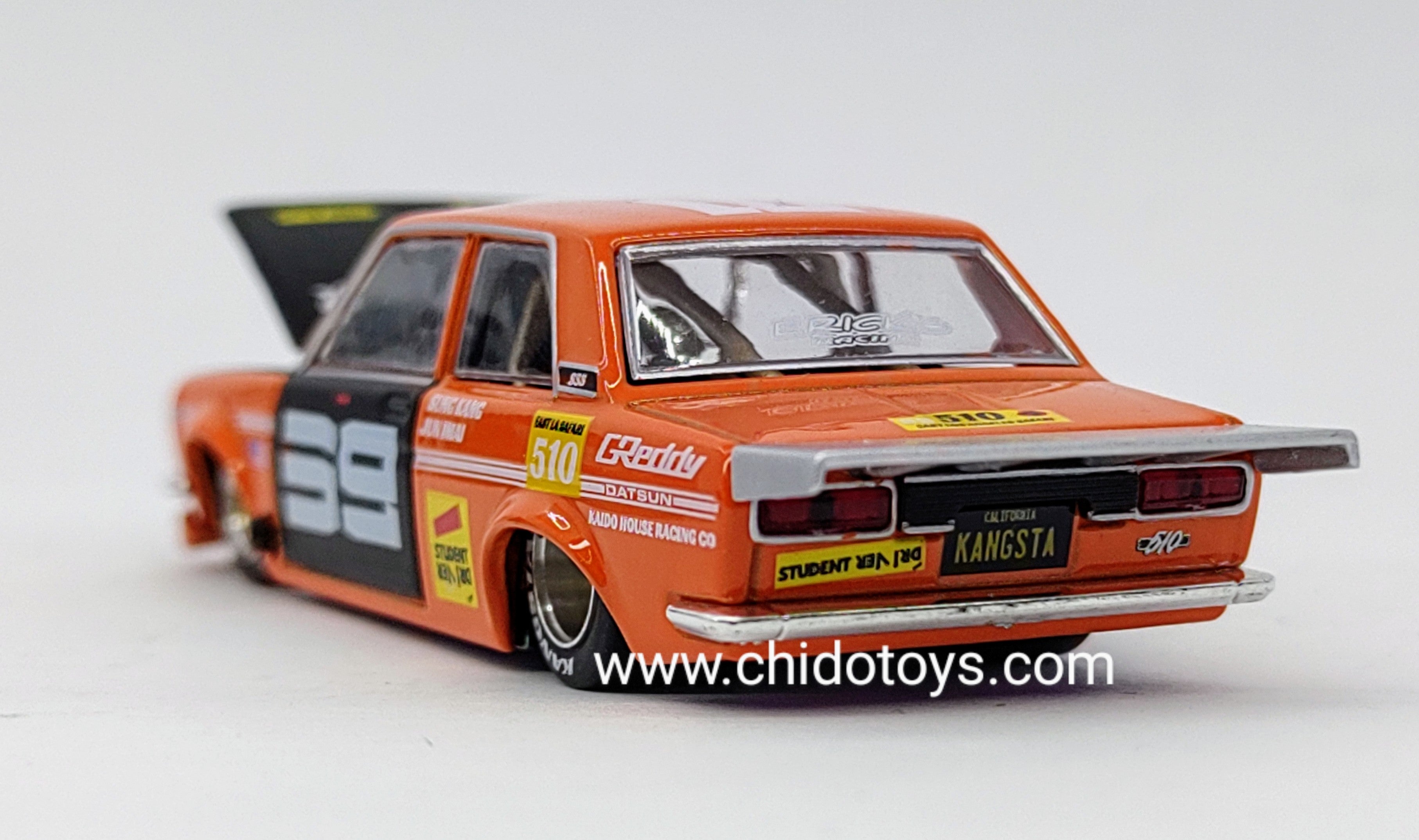 Auto a escala marca Mini Gt Kaido House, edad 14+, Color Naranja - Chido Toys