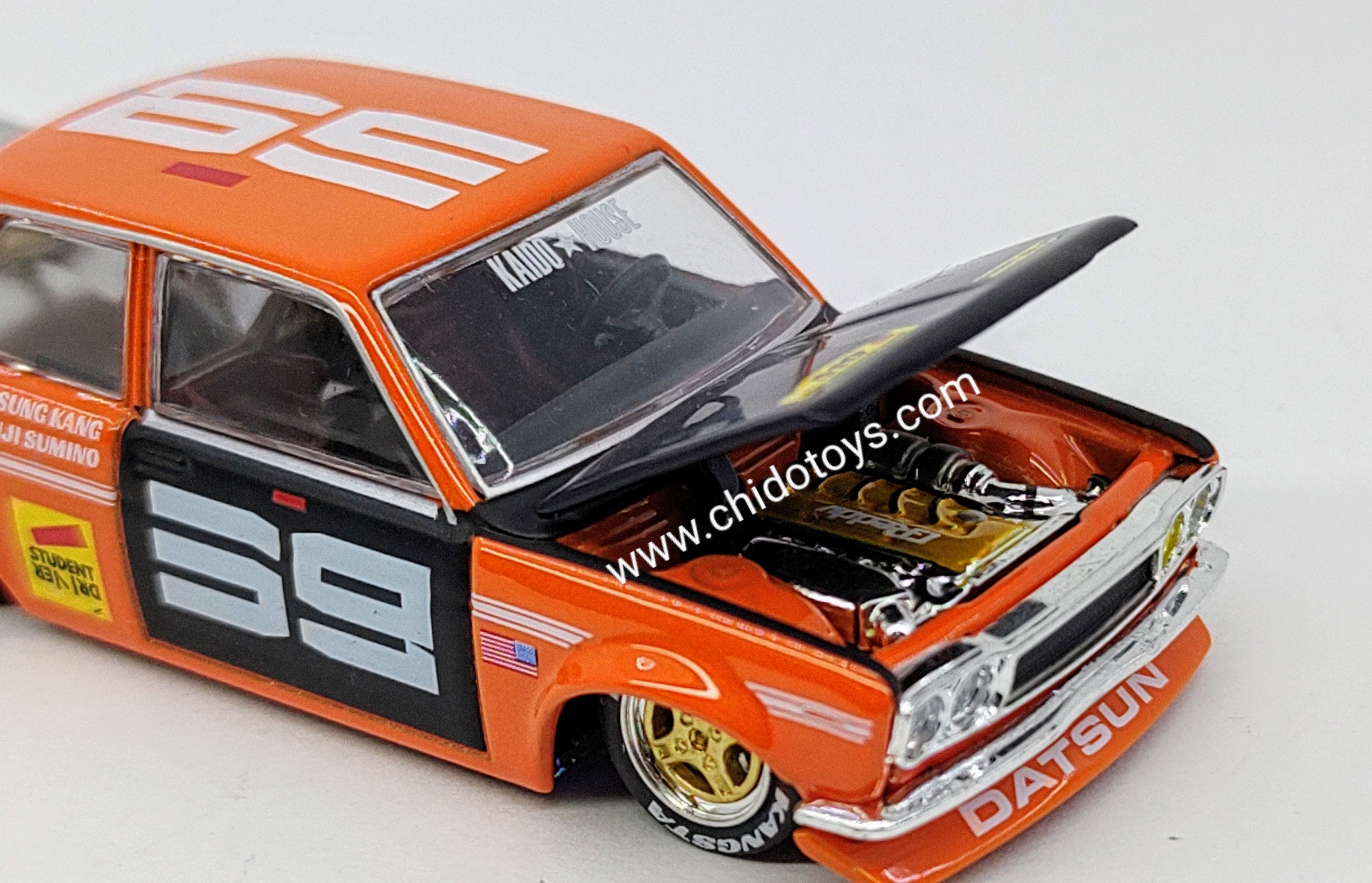Auto a escala marca Mini Gt Kaido House, edad 14+, Color Naranja - Chido Toys