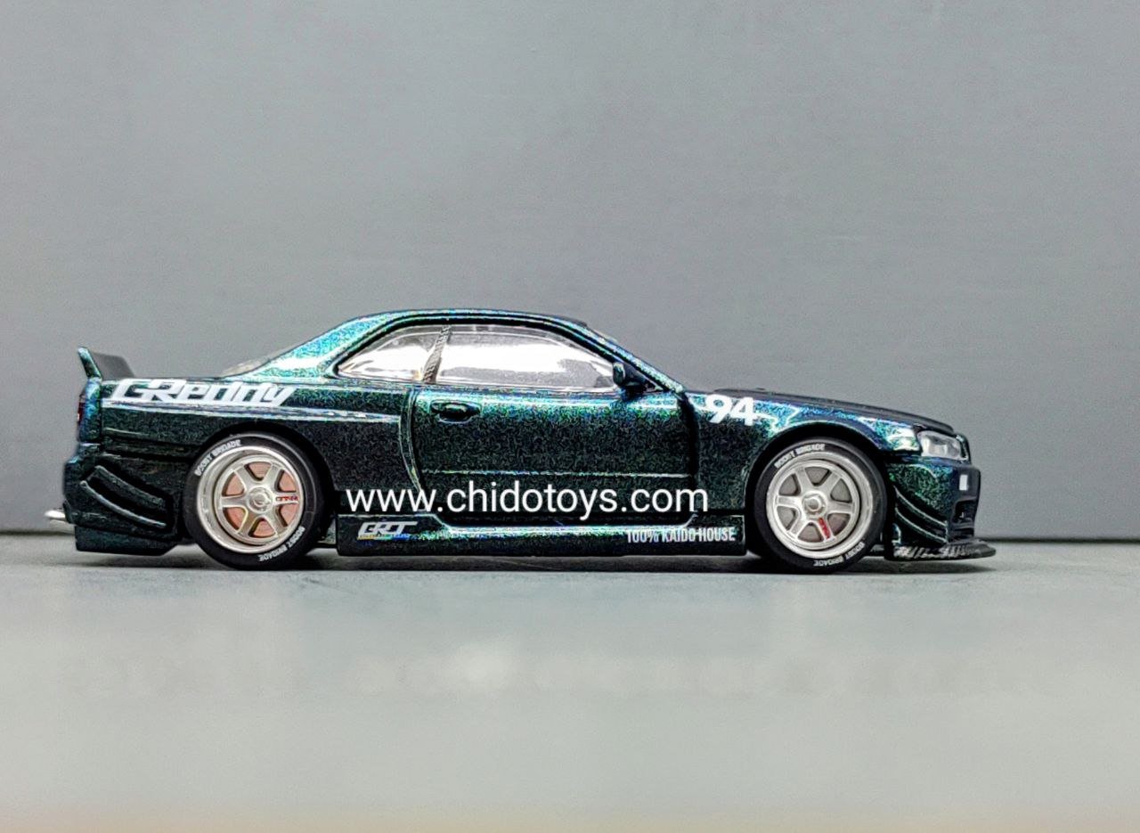 Auto a escala marca Mini GT, Modelo Nissan Skyline GT - R (R34) Kaido Works GReddy - Chido Toys