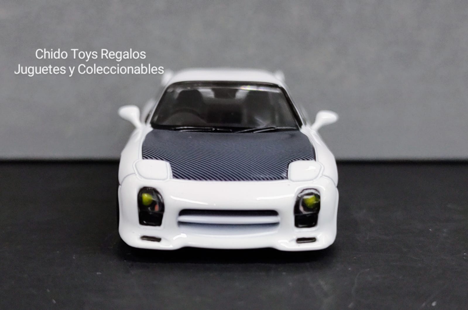 Auto a escala marca TARMAC, modelo Mazda RX - 3S - Chido Toys