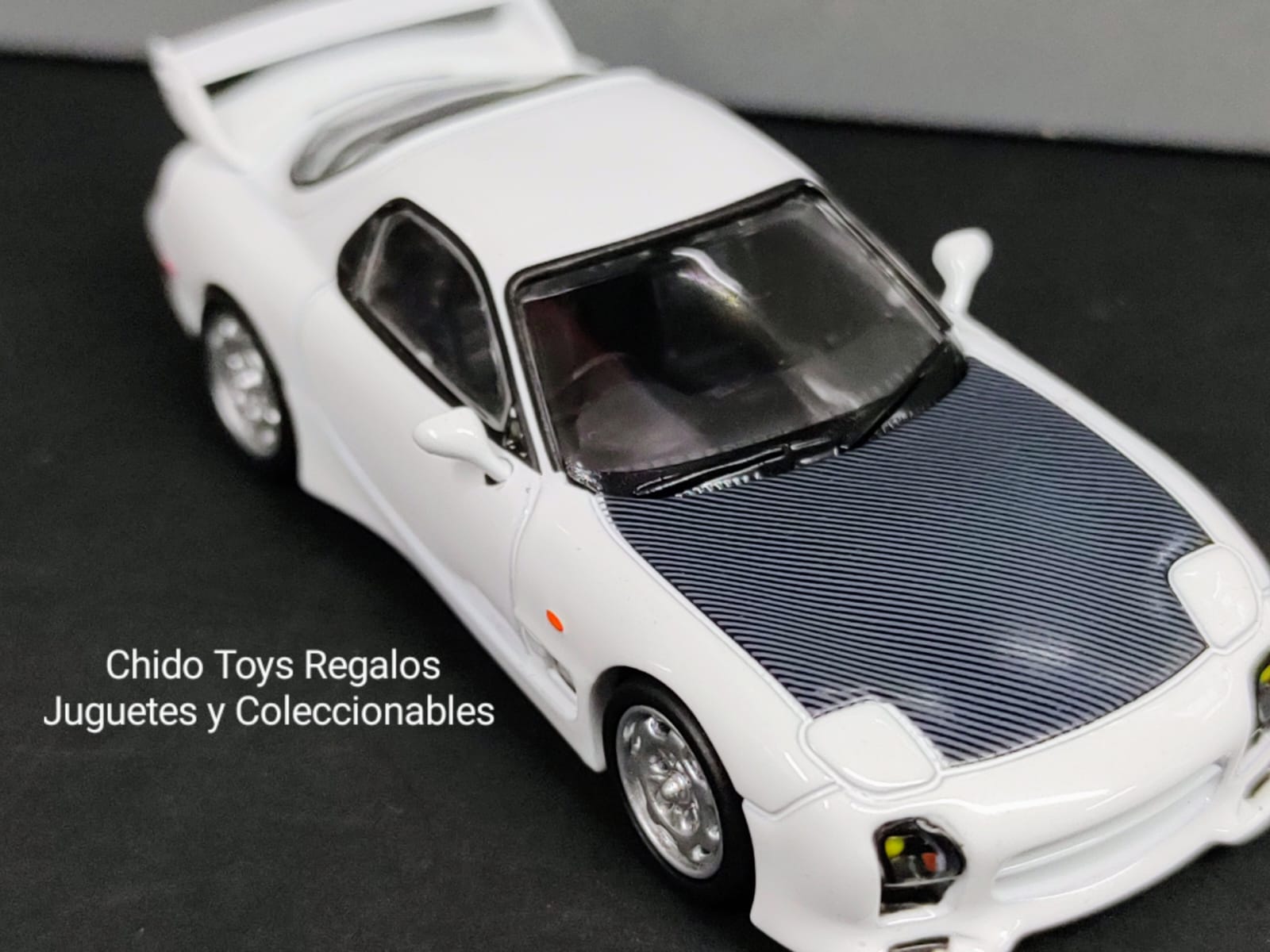 Auto a escala marca TARMAC, modelo Mazda RX - 3S - Chido Toys