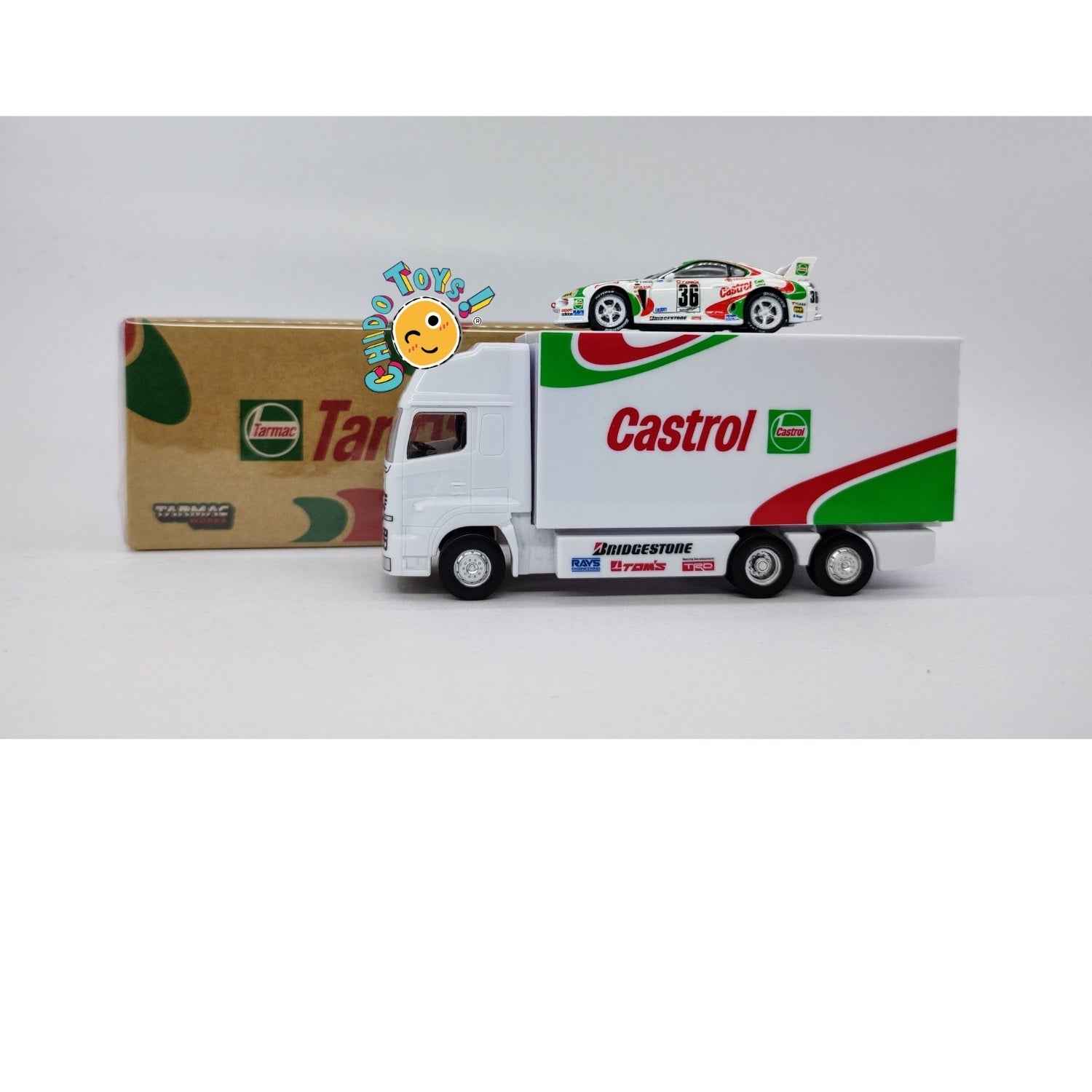 Auto a escala marca Tarmac Works, Modelo Toyota Supra GT JGTC 1995 M. Sekiya / M. Krumm con embalaje de camión - Chido Toys