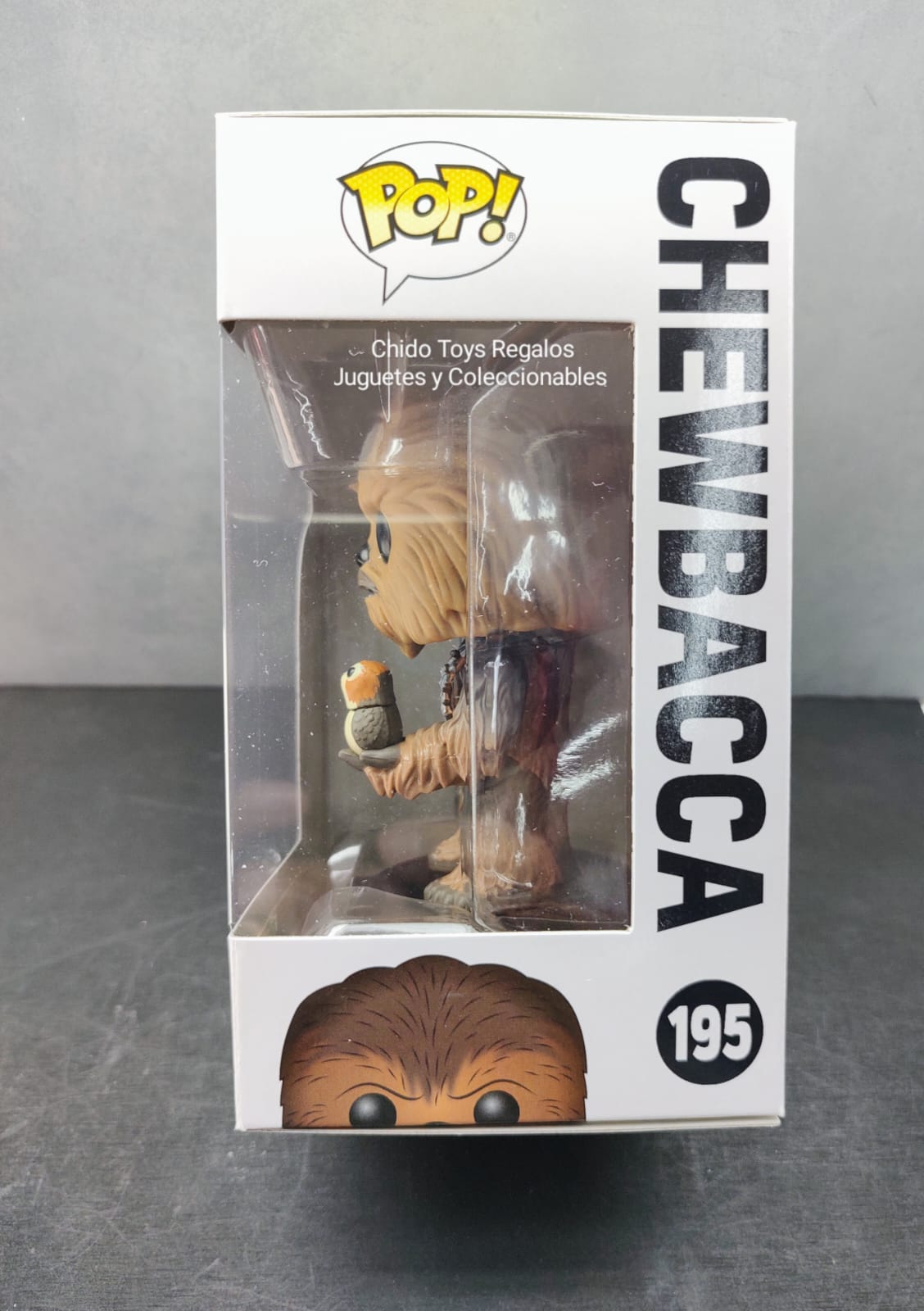 Figura de Vinyl, marca Funko, Modelo Chewbacca con Porg, edad 6+ - Chido Toys
