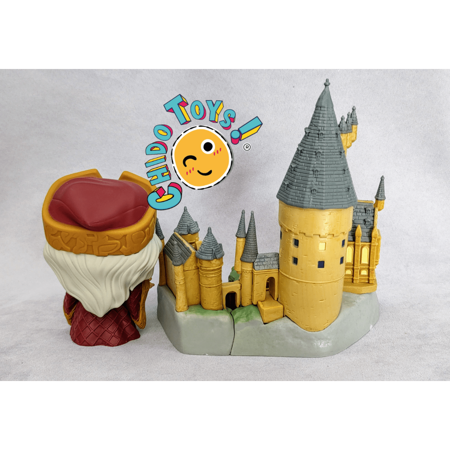 Figuras de vinyl, marca Funko, modelo Albus Dumbledore with Hogwarts - Chido Toys