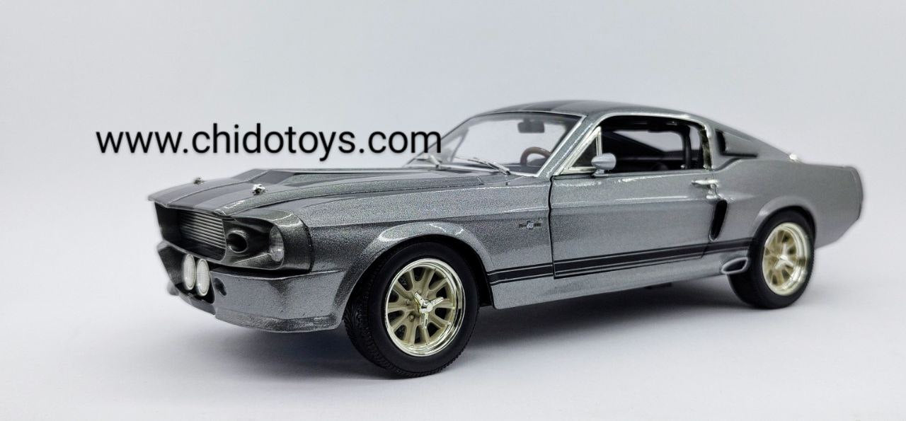 Ford Mustang 1967 Eleanor Greenlight 1:18 Gone in 60 Seconds die-cast gris con franjas negras.