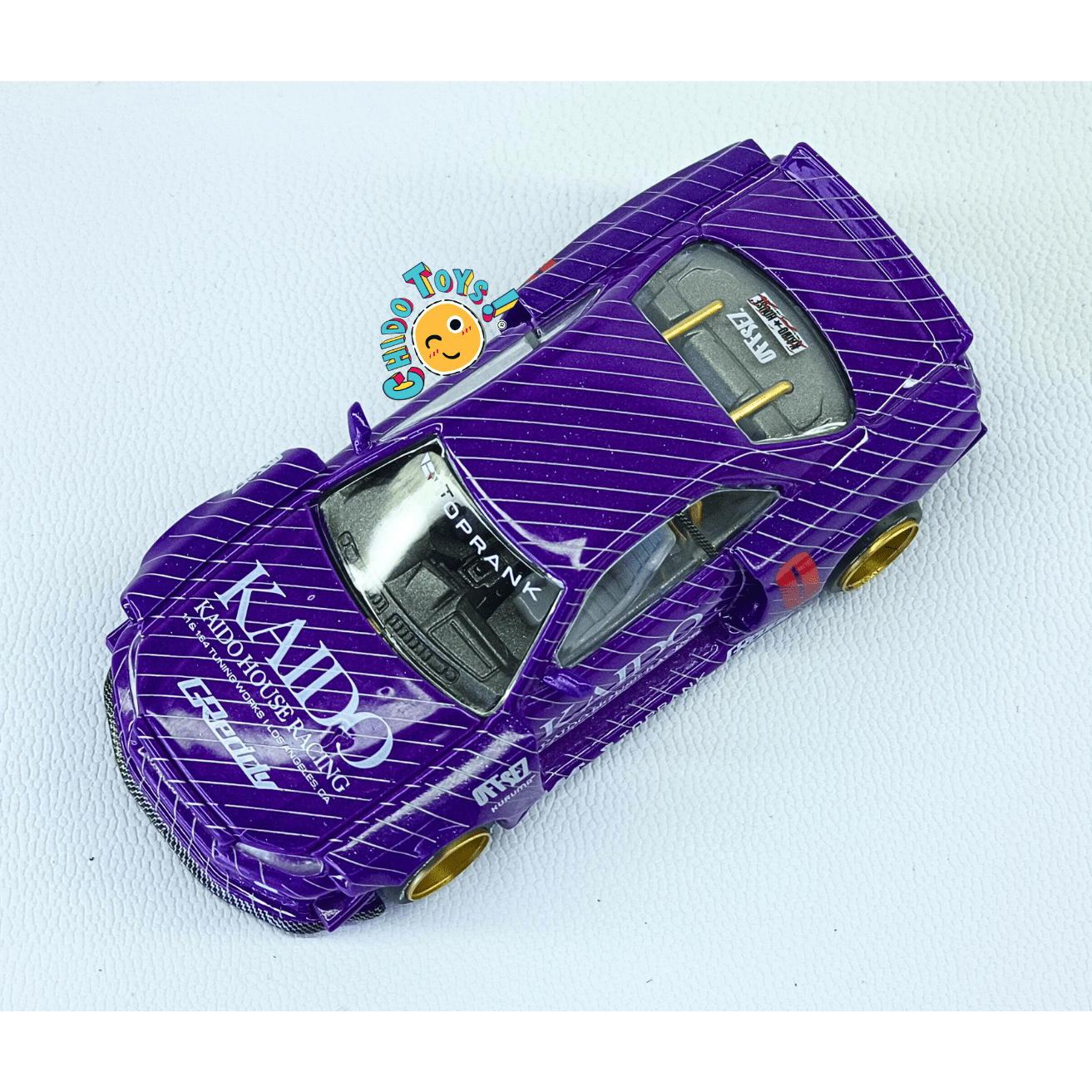 Kaido House 048 Nissan Skyline GT - R R34 CHASE 1:64 rines dorados - Chido Toys