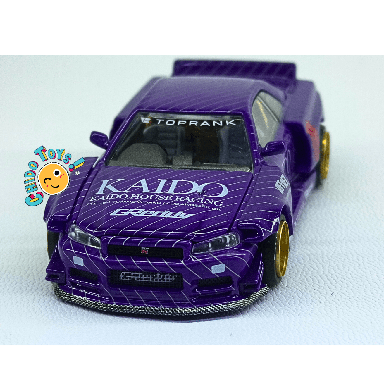 Kaido House 048 Nissan Skyline GT - R R34 CHASE 1:64 rines dorados - Chido Toys