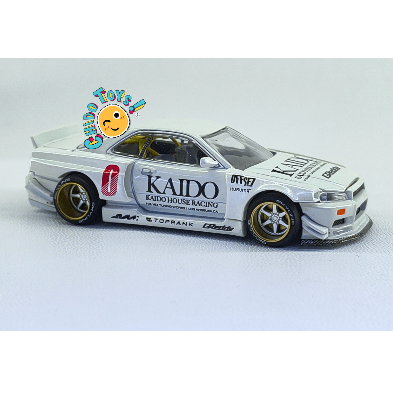 Kaido House 049 Nissan Skyline GT - R R34 White CHASE 1:64 | Cofre Abierto | Metal - Chido Toys