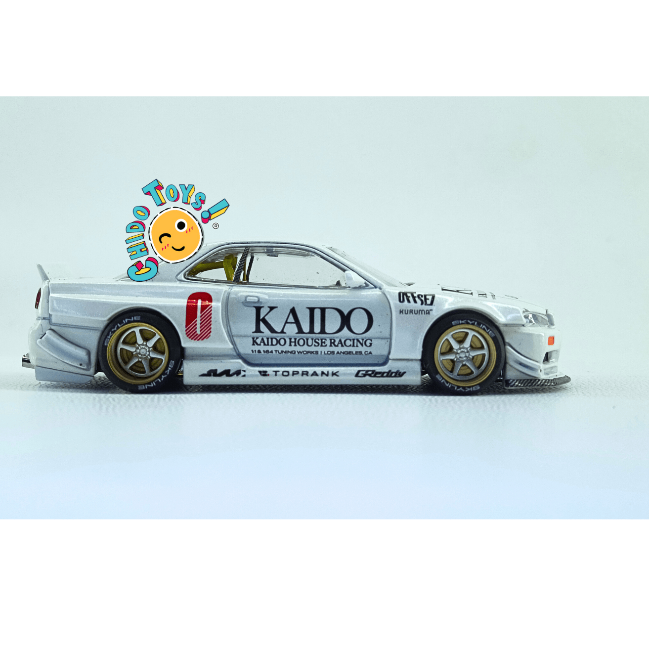 Kaido House 049 Nissan Skyline GT - R R34 White CHASE 1:64 | Cofre Abierto | Metal - Chido Toys