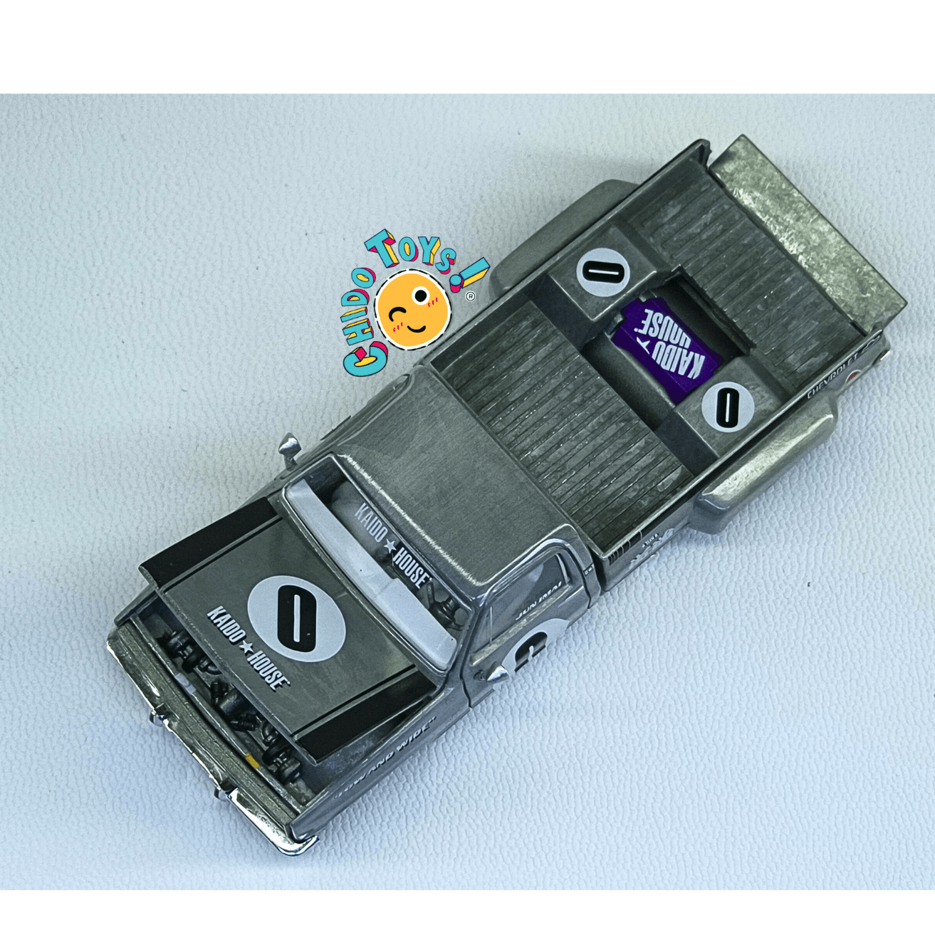 Kaido House 084 Chevrolet Silverado Dually Primera Edición CHASE 1:64 - Chido Toys