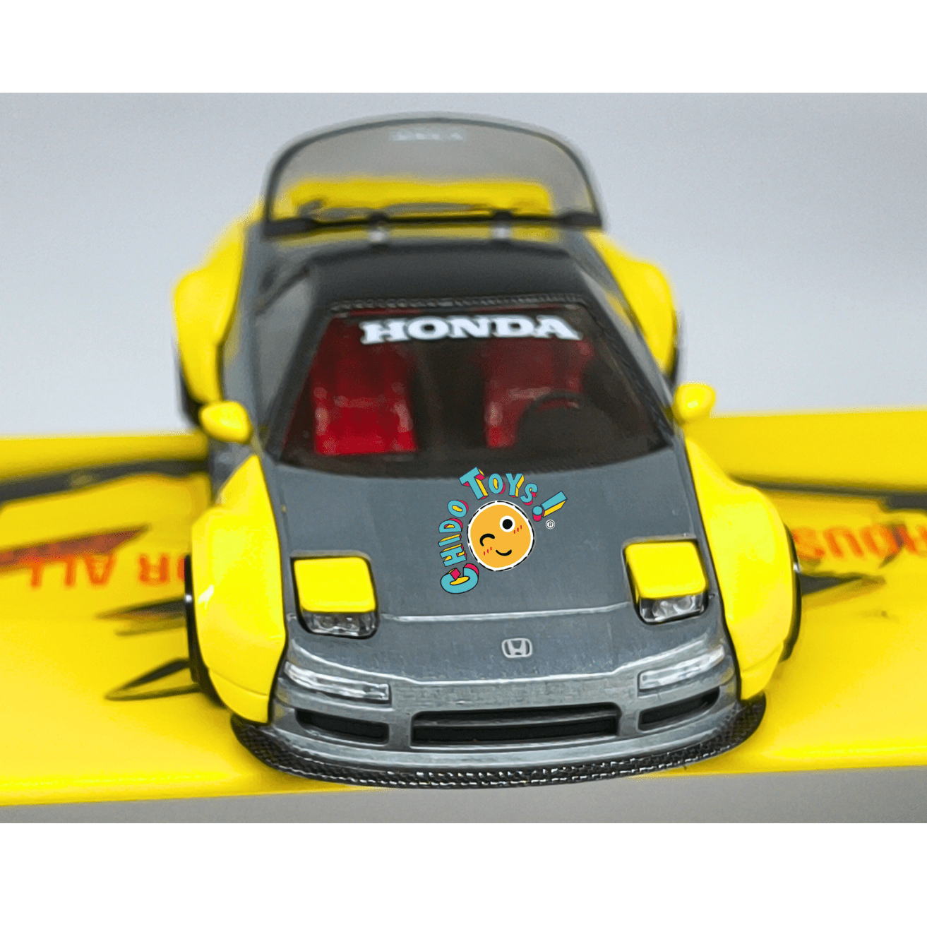 Kaido House Honda NSX 1:64 CHASE gris/amarillo con tapa de motor - Chido Toys