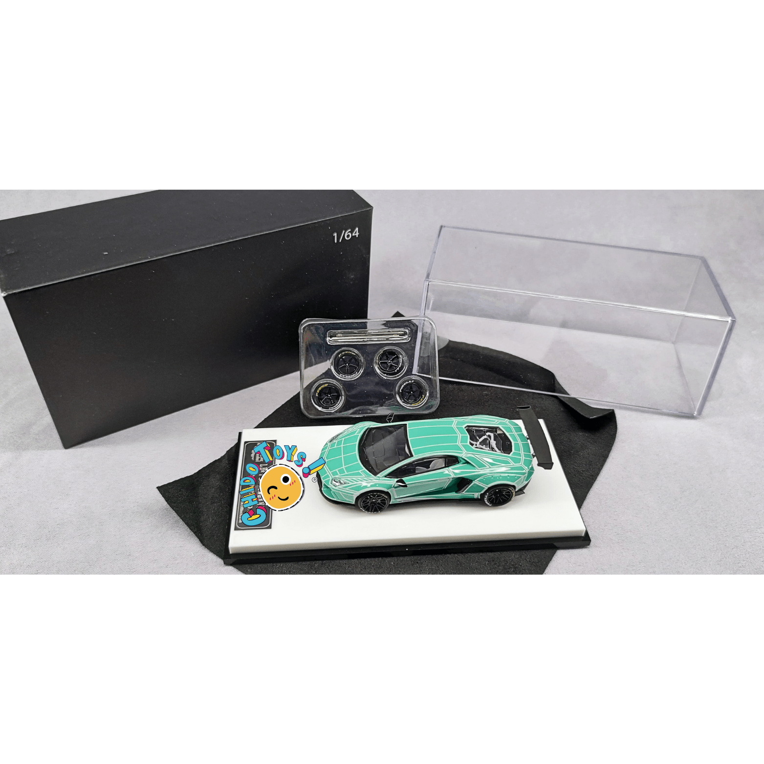 Lamborghini 1:64 King Model – Die - Cast con Rines Intercambiables, Llantas de Goma y Paño de Limpieza - Chido Toys