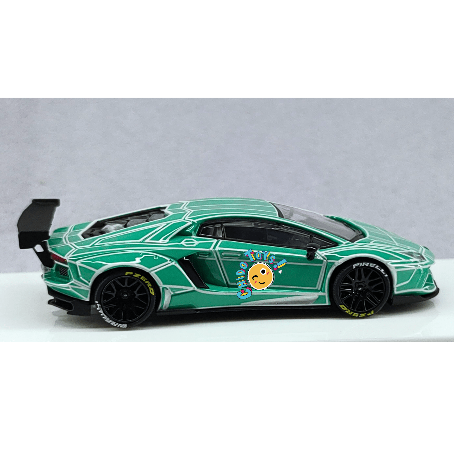 Lamborghini 1:64 King Model – Die - Cast con Rines Intercambiables, Llantas de Goma y Paño de Limpieza - Chido Toys