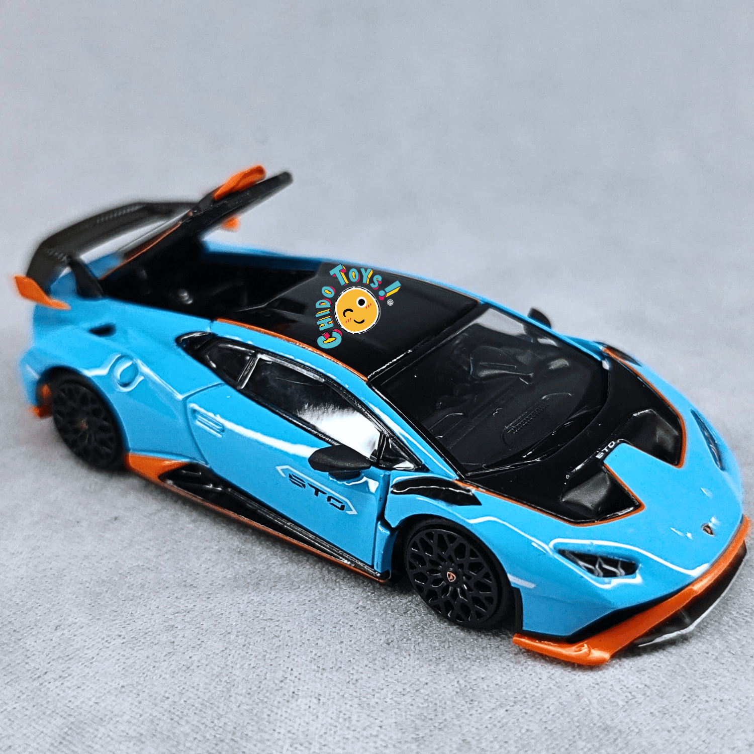 Lamborghini Huracán STO 1:64 de PopRace – Metal, Llantas de Goma y Capó Desmontable - Chido Toys