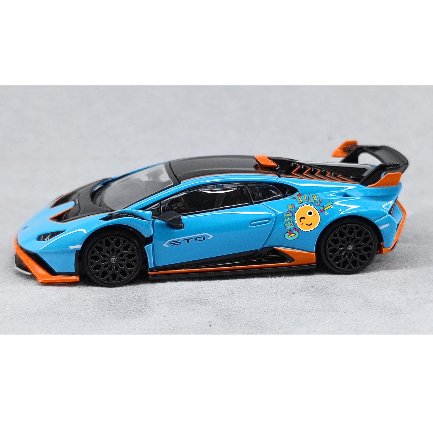 Lamborghini Huracán STO 1:64 de PopRace – Metal, Llantas de Goma y Capó Desmontable - Chido Toys