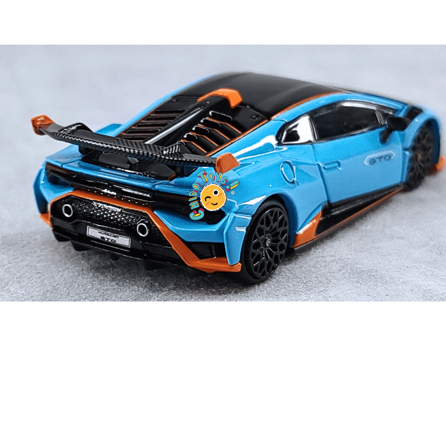 Lamborghini Huracán STO 1:64 de PopRace – Metal, Llantas de Goma y Capó Desmontable - Chido Toys