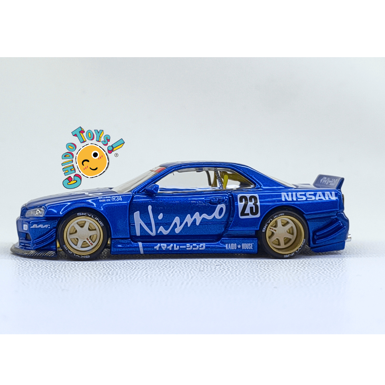 Nissan Skyline GT - R R34 Kaido House x Mini GT Nismo 23 – Versión CHASE – Escala 1:64 - Chido Toys