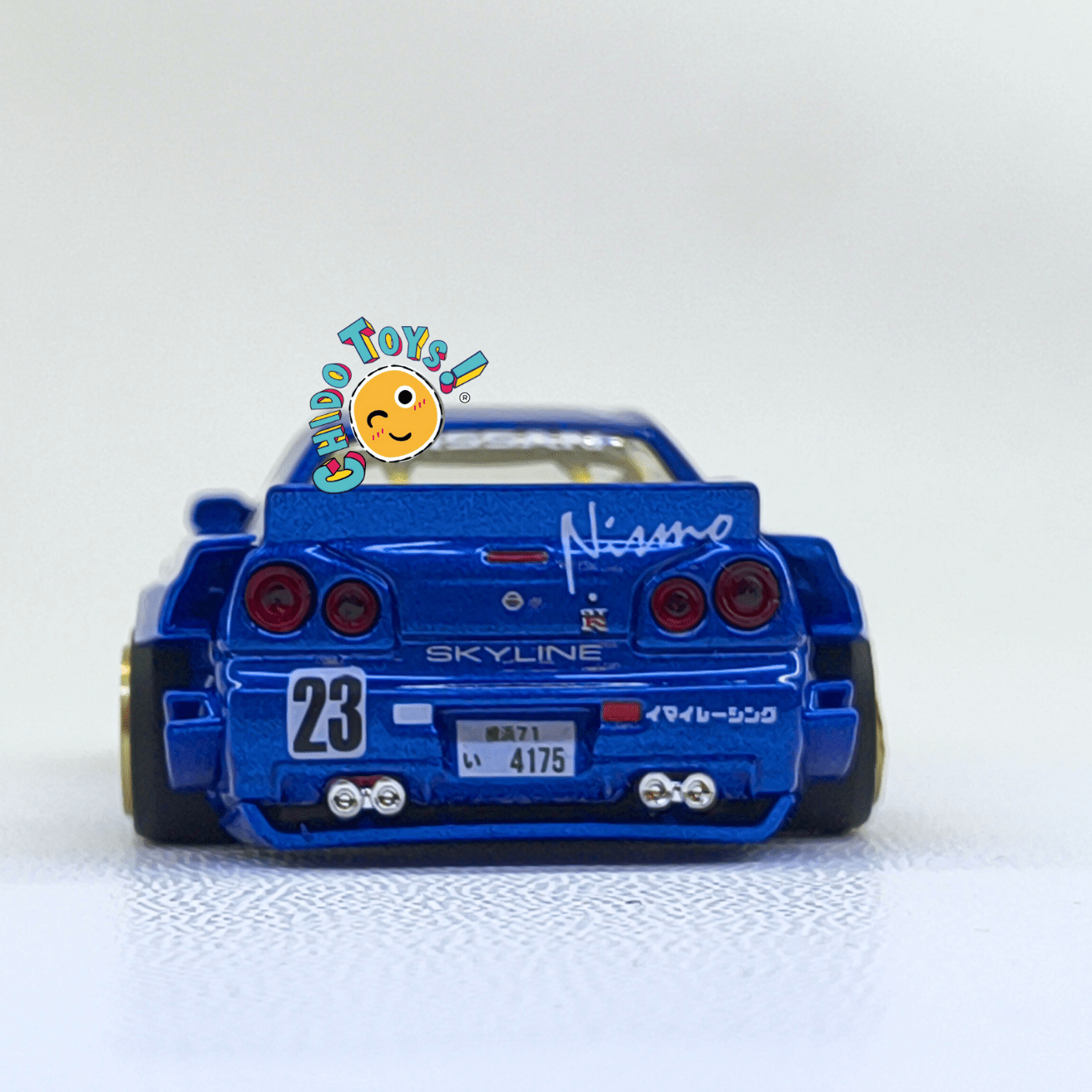 Nissan Skyline GT - R R34 Kaido House x Mini GT Nismo 23 – Versión CHASE – Escala 1:64 - Chido Toys