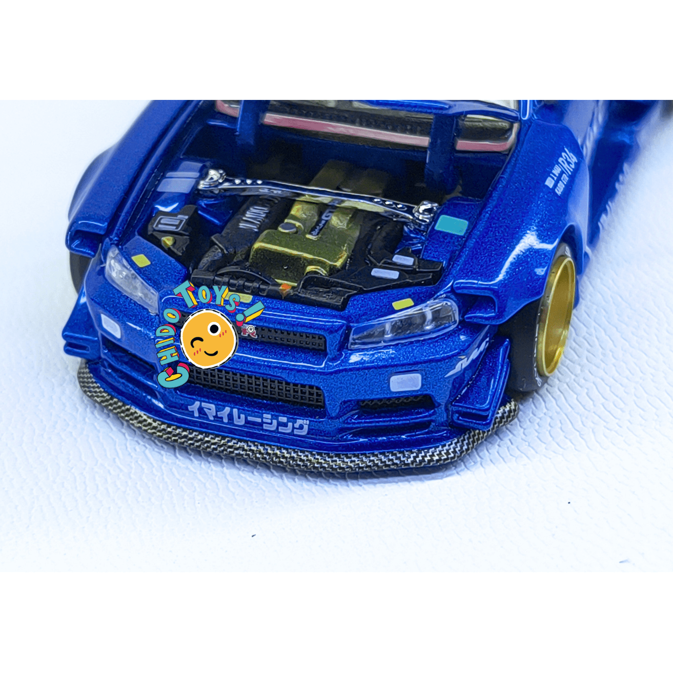 Nissan Skyline GT - R R34 Kaido House x Mini GT Nismo 23 – Versión CHASE – Escala 1:64 - Chido Toys