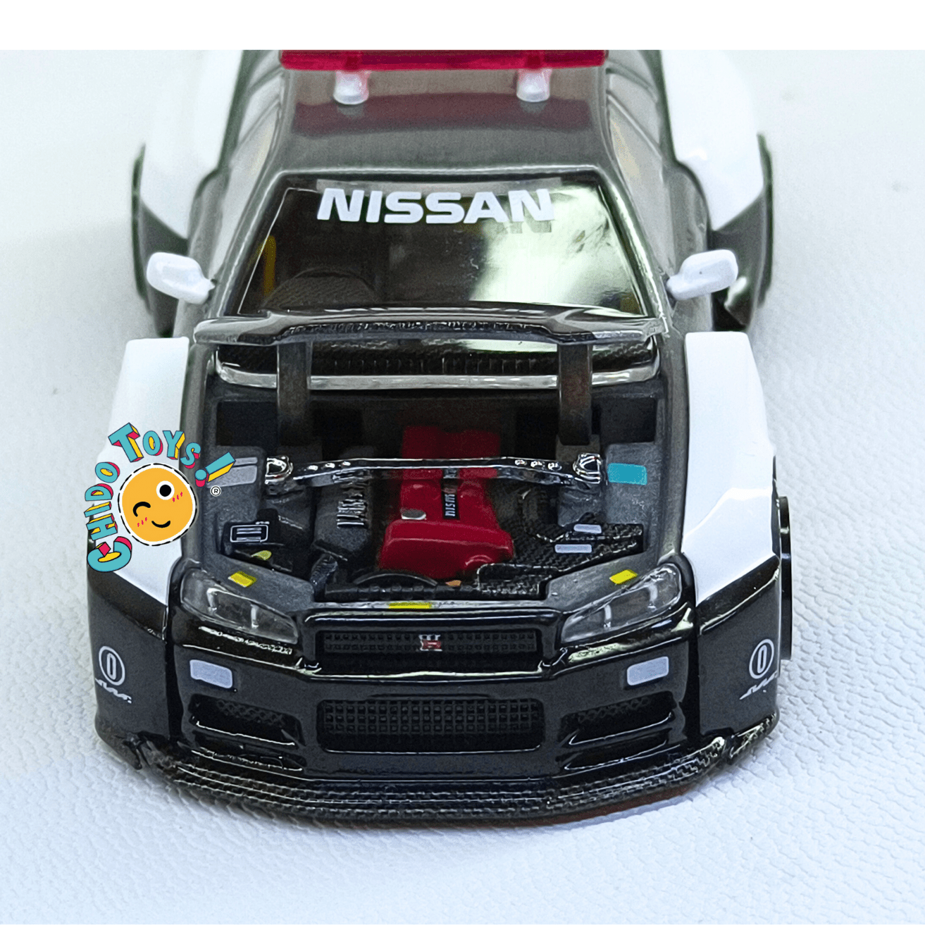 Nissan Skyline GT - R R34 Kaido Works V2 Aero Japan Police – Versión CHASE | Mini GT x Kaido House | 1:64 - Chido Toys