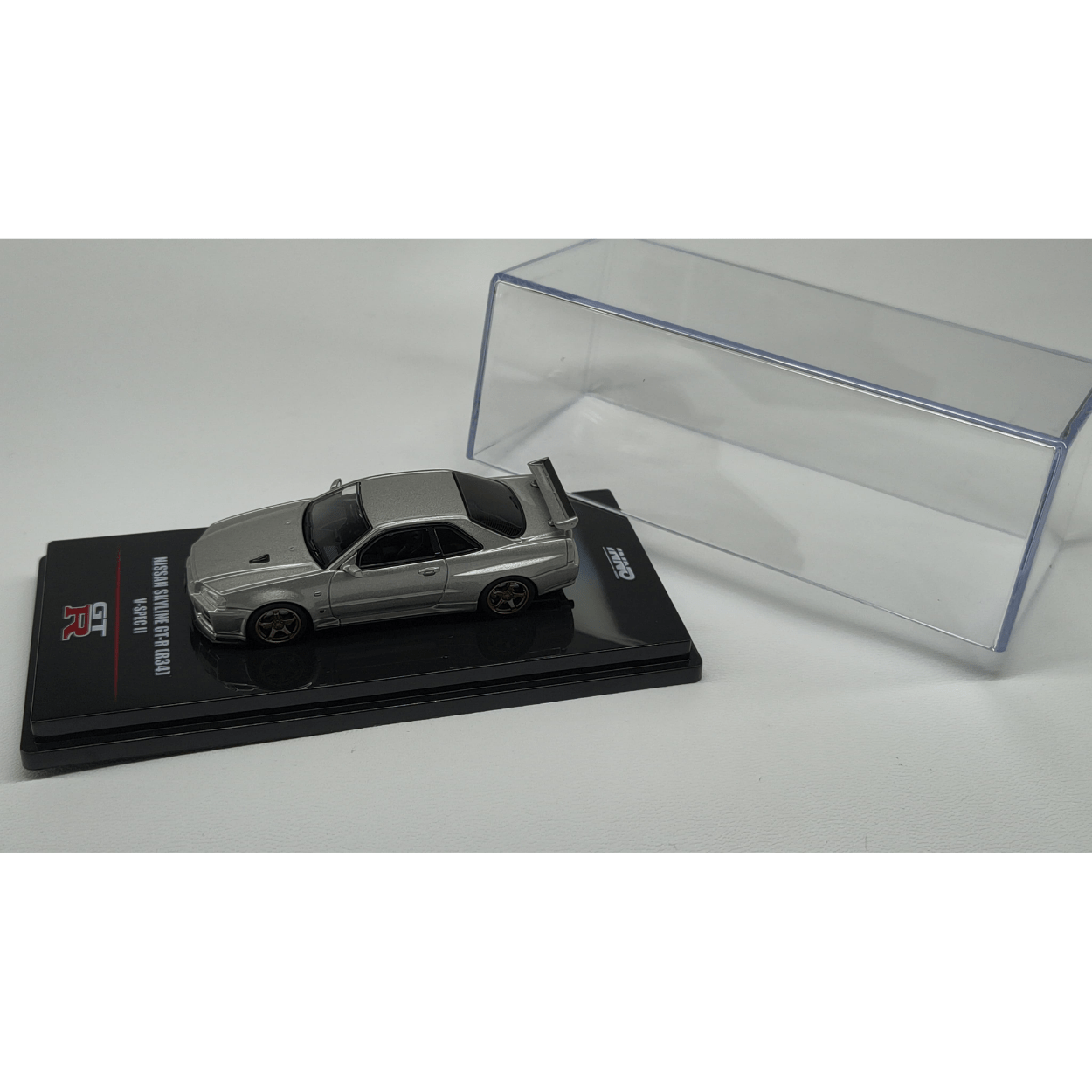 Nissan Skyline GT - R (R34) V - Spec II Plata – Inno64 1:64 - Chido Toys