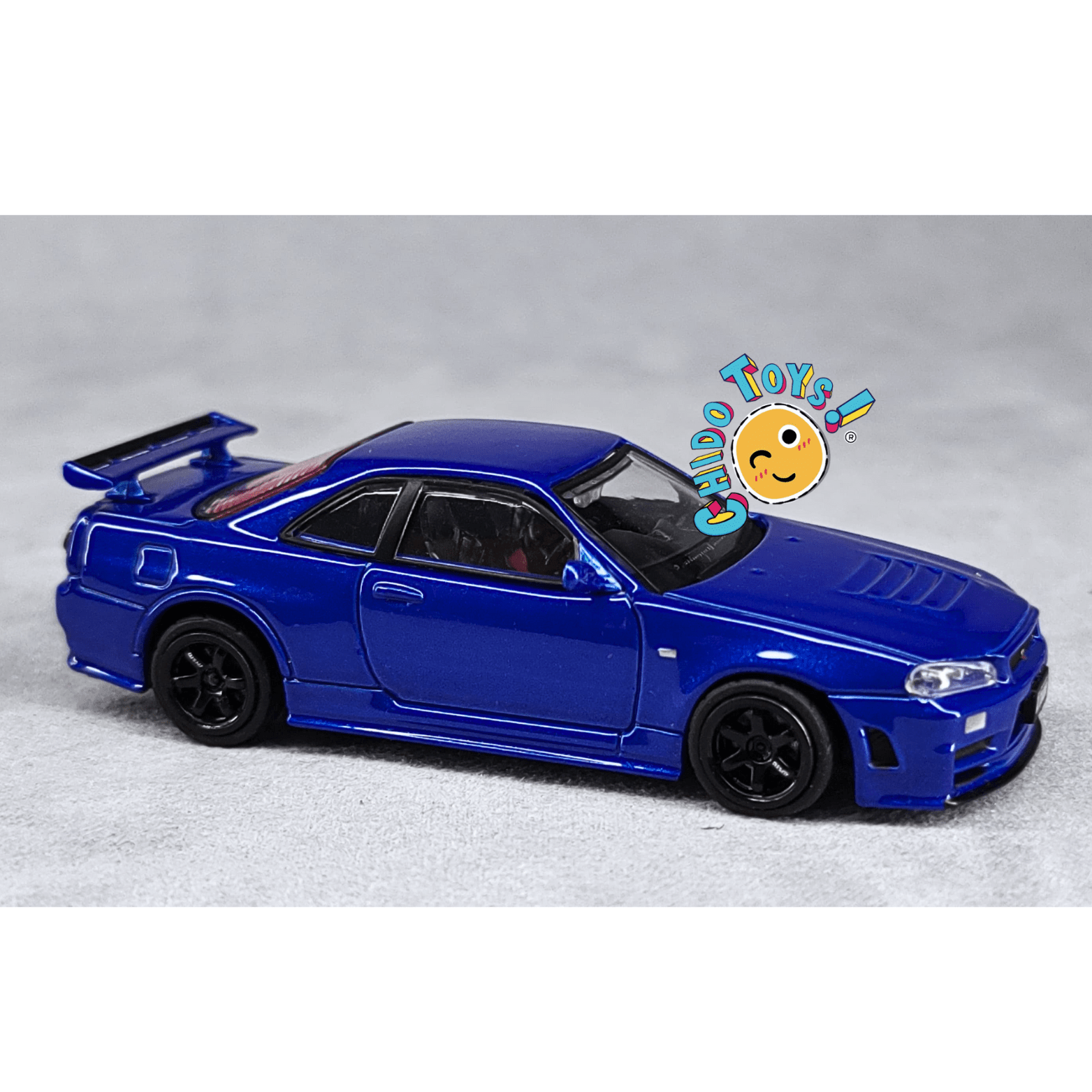 Nissan Skyline GT - R R34 Z - Tune 1/64 - Top Art - Chido Toys
