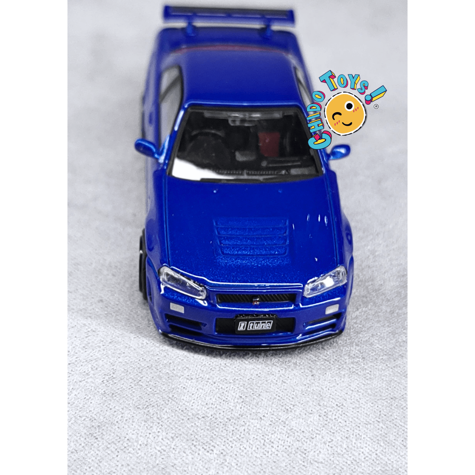 Nissan Skyline GT - R R34 Z - Tune 1/64 - Top Art - Chido Toys