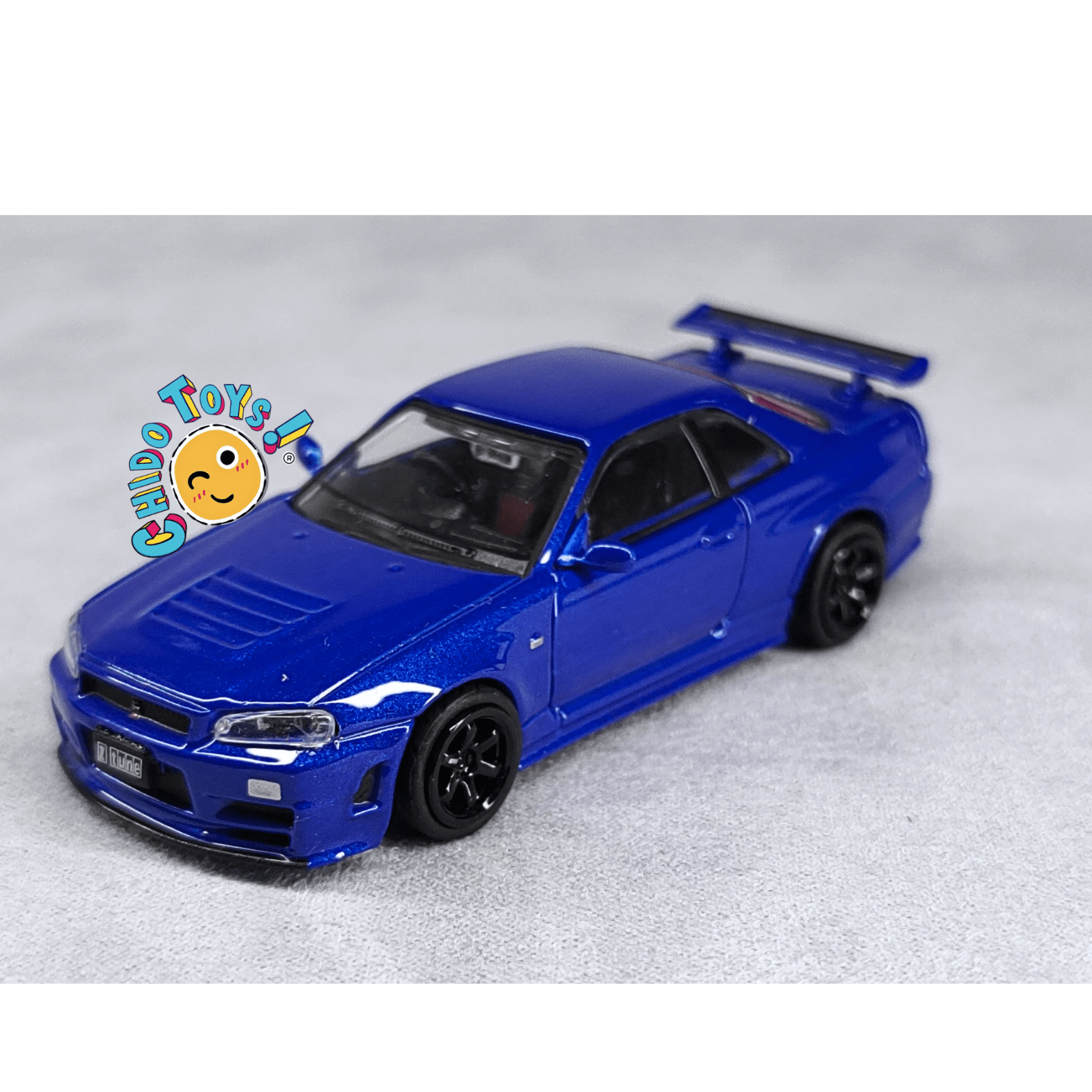 Nissan Skyline GT - R R34 Z - Tune 1/64 - Top Art - Chido Toys