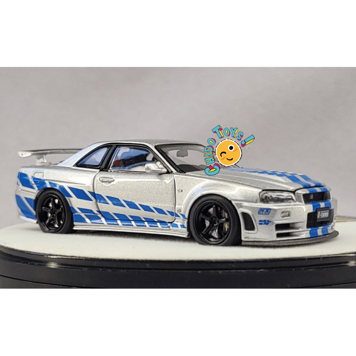 Nissan Skyline GT - R R34 Z - Tune Silver Blue Stripe – PGM 1:64 - Chido Toys