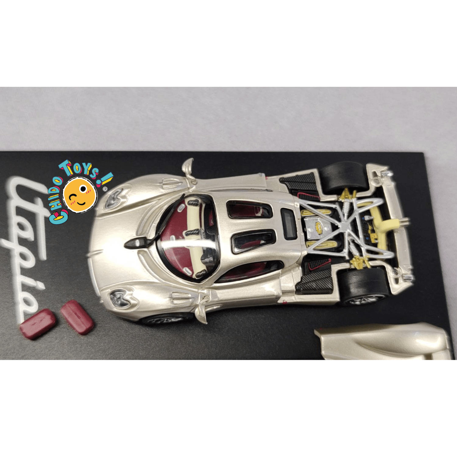 Pagani Utopia Champagne Golden – CM Models 1:64 - Chido Toys