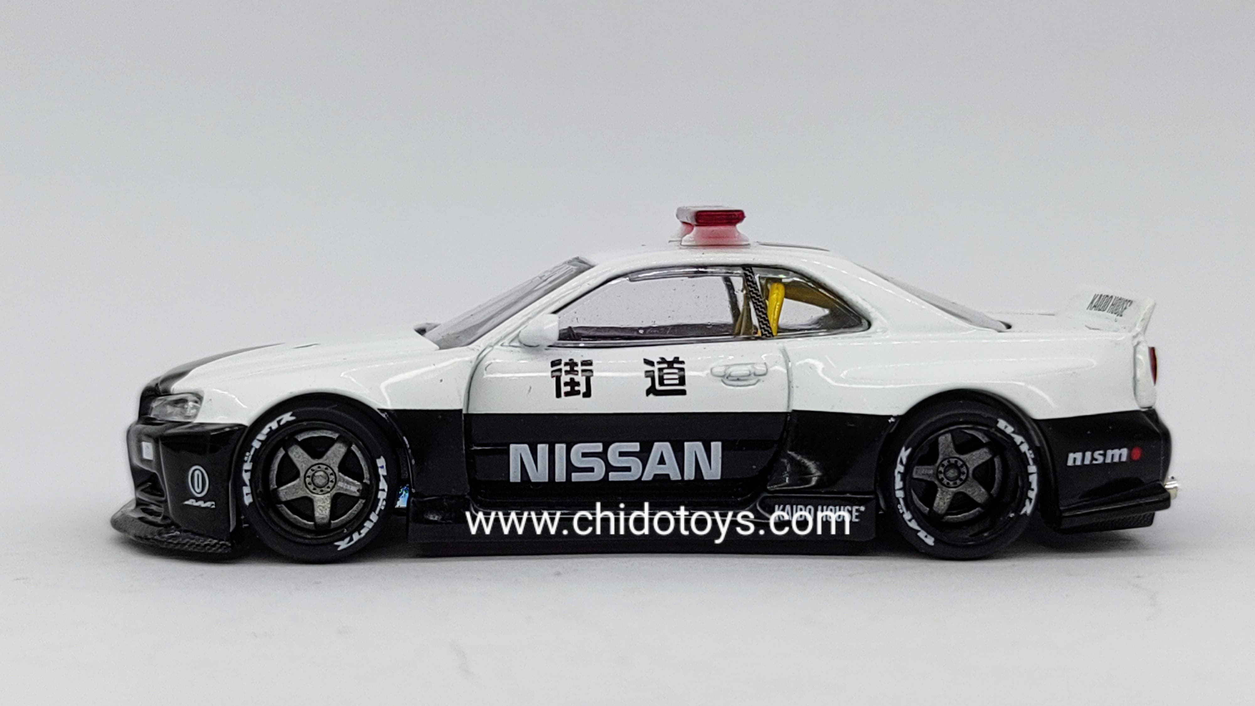 Patrulla a escala marca Kaido House, Modelo Nissan Skyline GT - R (R34) V2 AERO (JAPAN POLICE) - Chido Toys