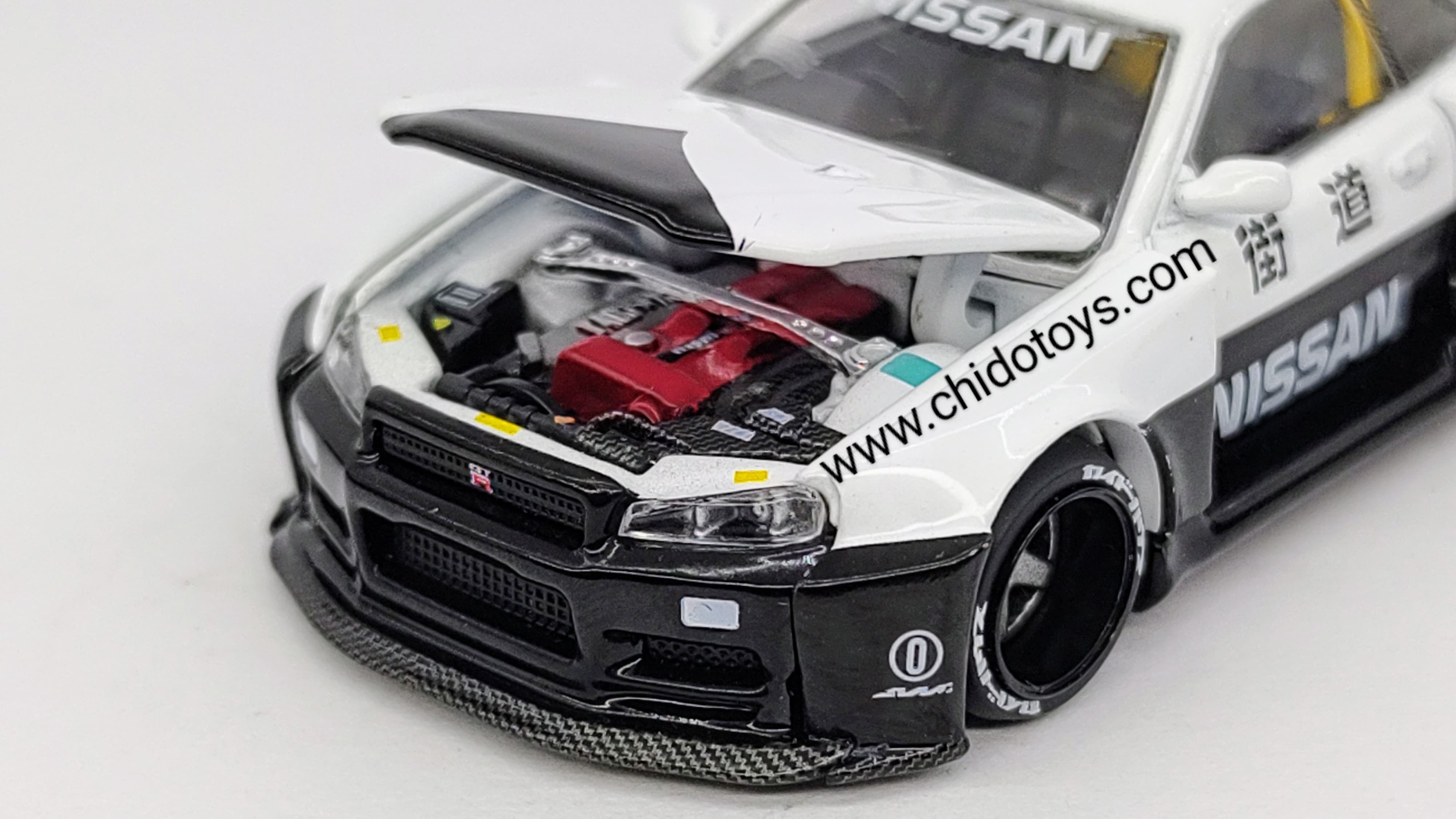 Patrulla a escala marca Kaido House, Modelo Nissan Skyline GT - R (R34) V2 AERO (JAPAN POLICE) - Chido Toys