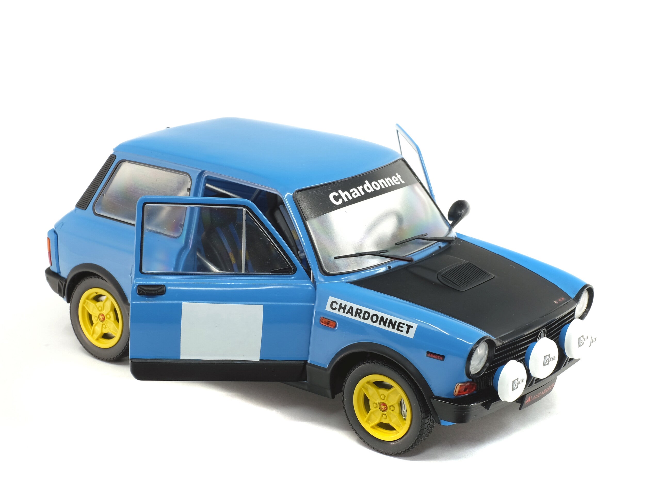 Solido Autobianchi A112 MK5 Abarth Chardonnet Rally 1980 escala 1:18 azul con cofre negro, puertas abatibles, interior detallado y llantas de goma.