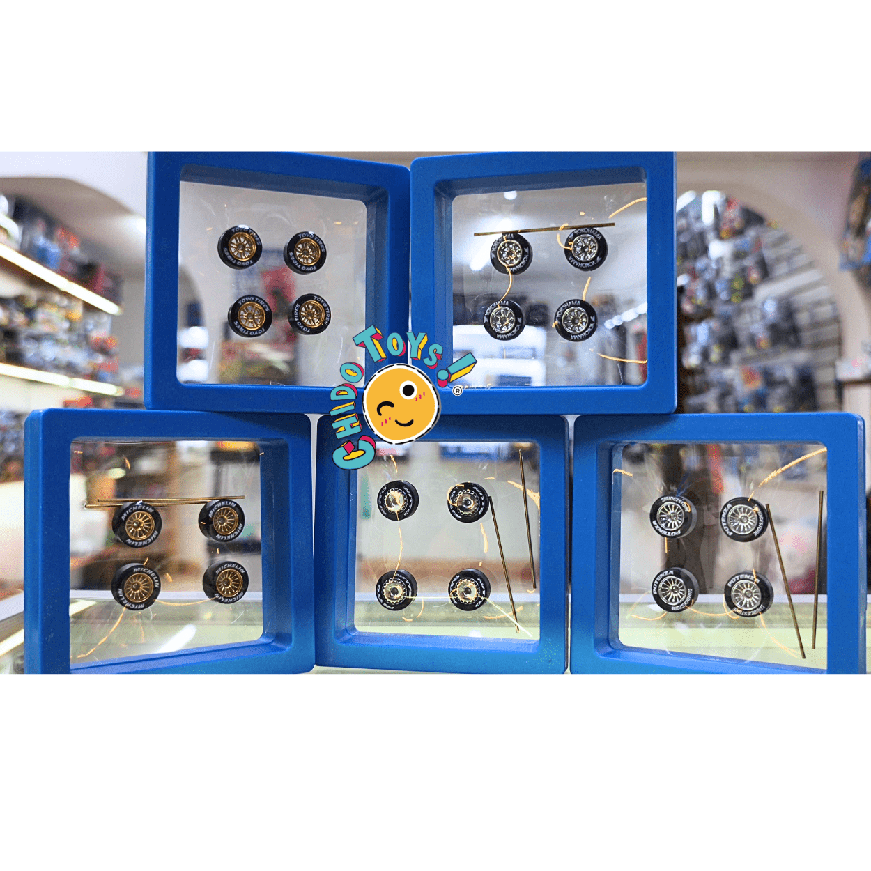 Set de llantas de goma para escala 1:64 con rines tipo diamante y ejes incluidos - Chido Toys