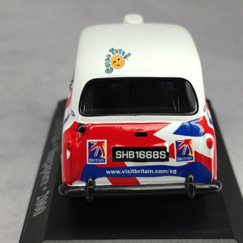 Taxi LTI FX4 Singapore 2000 a Escala 1:43 | Cuerpo de Metal | Base de Exhibición | Visit Britain Edition - Chido Toys