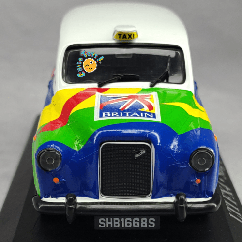 Taxi LTI FX4 Singapore 2000 a Escala 1:43 | Cuerpo de Metal | Base de Exhibición | Visit Britain Edition - Chido Toys